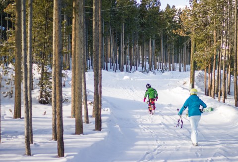 Walking from the cabin to the ski run