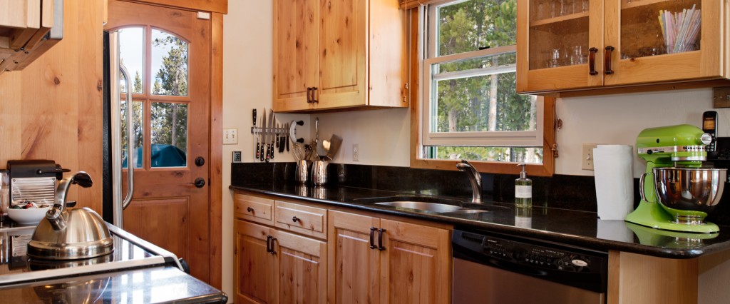 Newly equipped kitchen full of quality bench top appliances and kitchenware